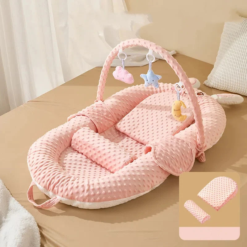 reducteur-de-lit-pour-bebe-confort-rose