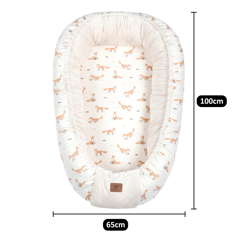 reducteur-de-lit-pour-bebe-pratique-caractéristiques