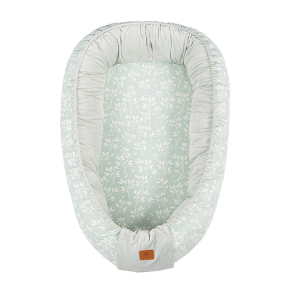 reducteur-de-lit-pour-bebe-pratique-herbe
