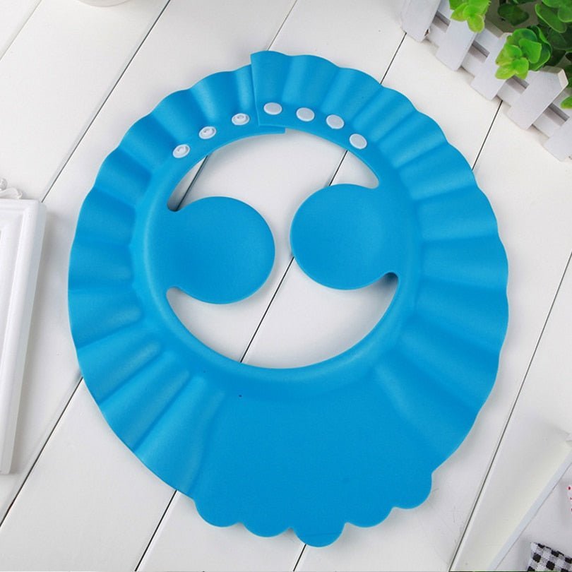 Visière chapeau pour douche bébé I ShampooCap™ - Bébés et Mamans